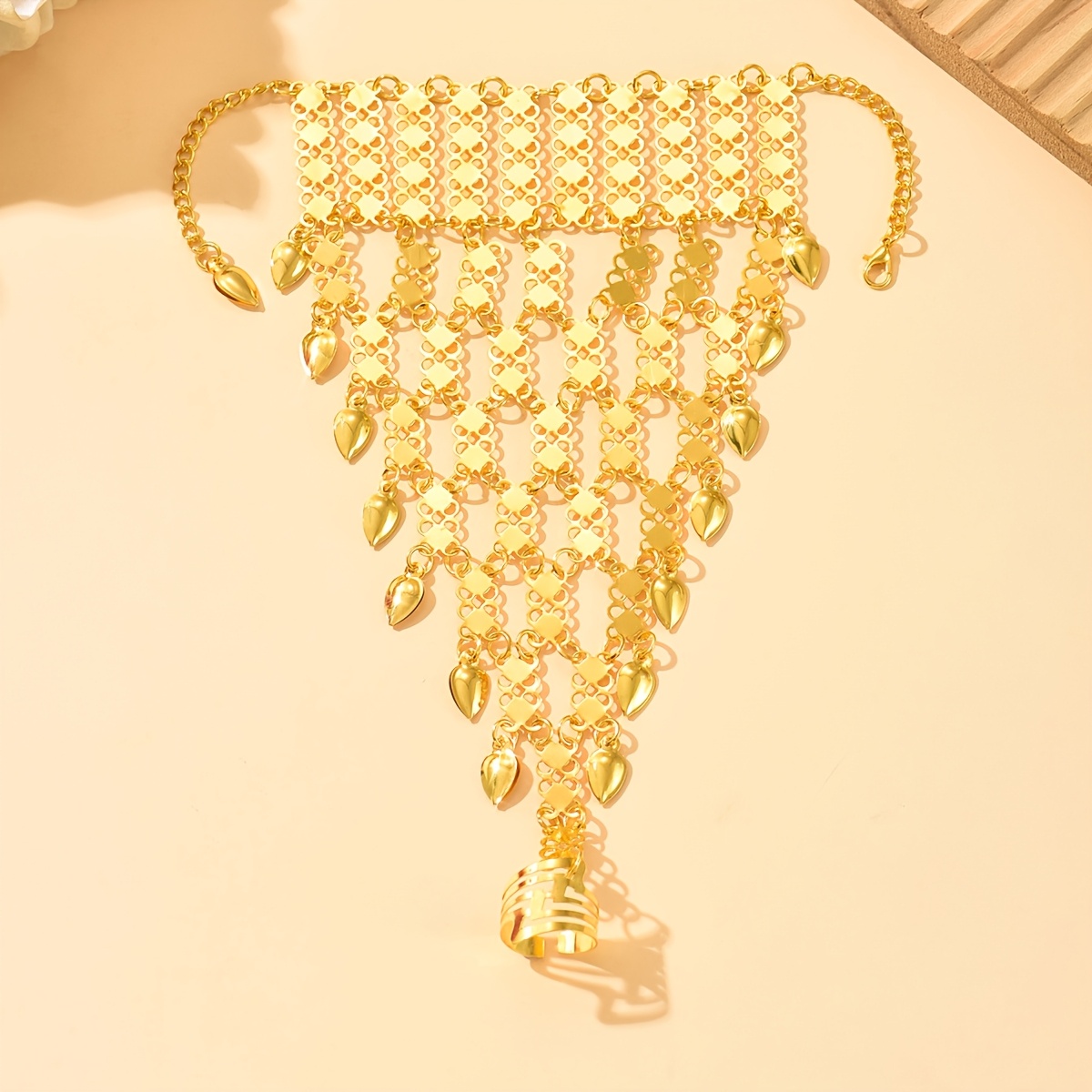 Heart-Shaped Tassel Ethnic Bracelet with Golden Detailing